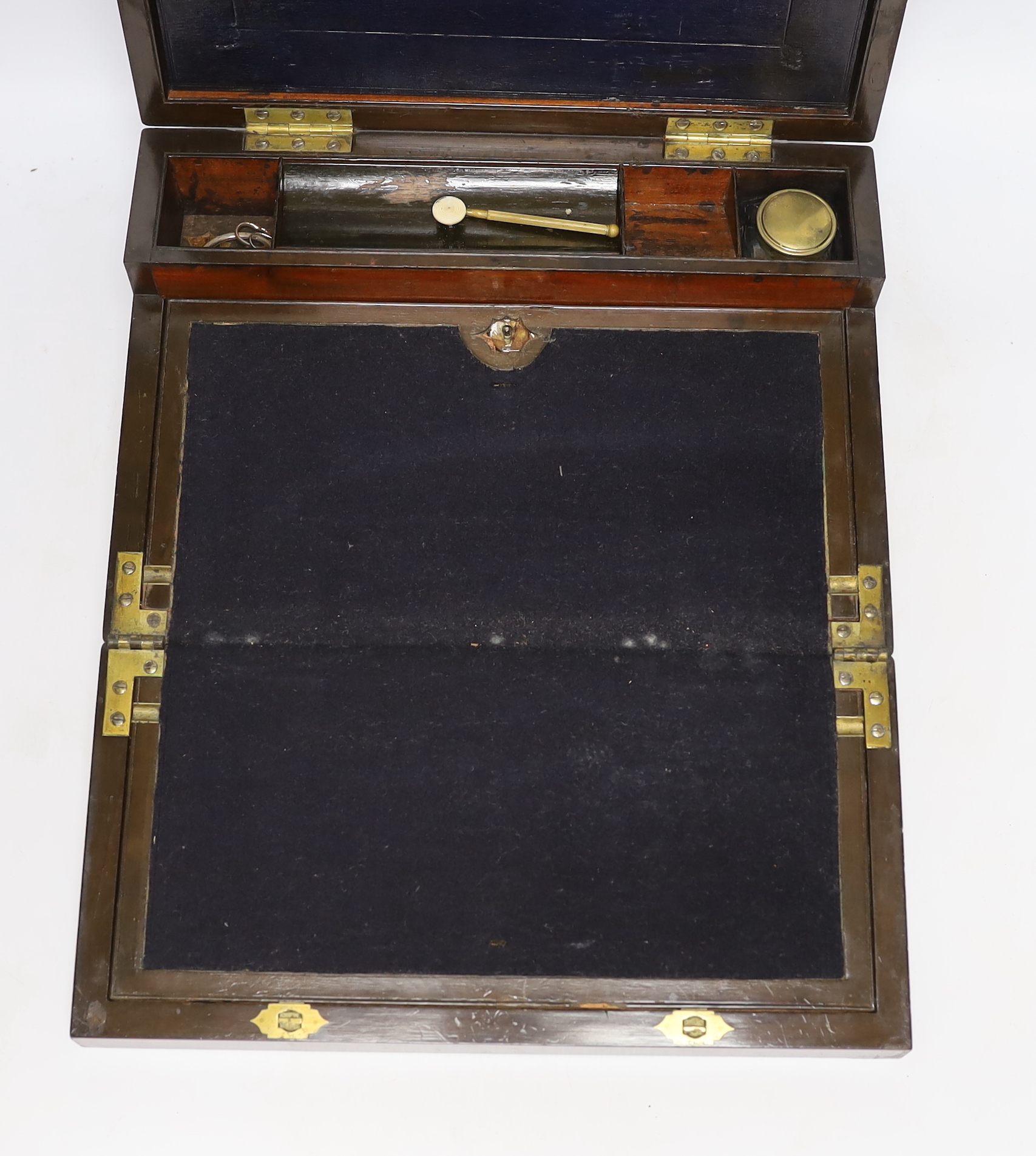 A 19th century brass bound mahogany writing slope, 35cm wide x 13.5cm high x 25cm deep